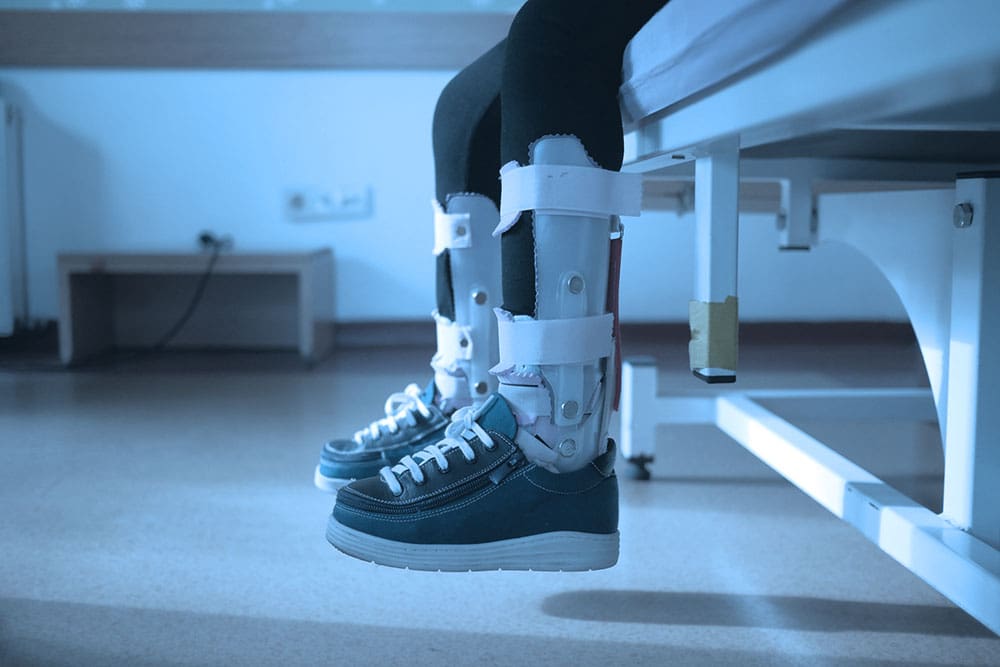 image of child's legs in orthosis braces